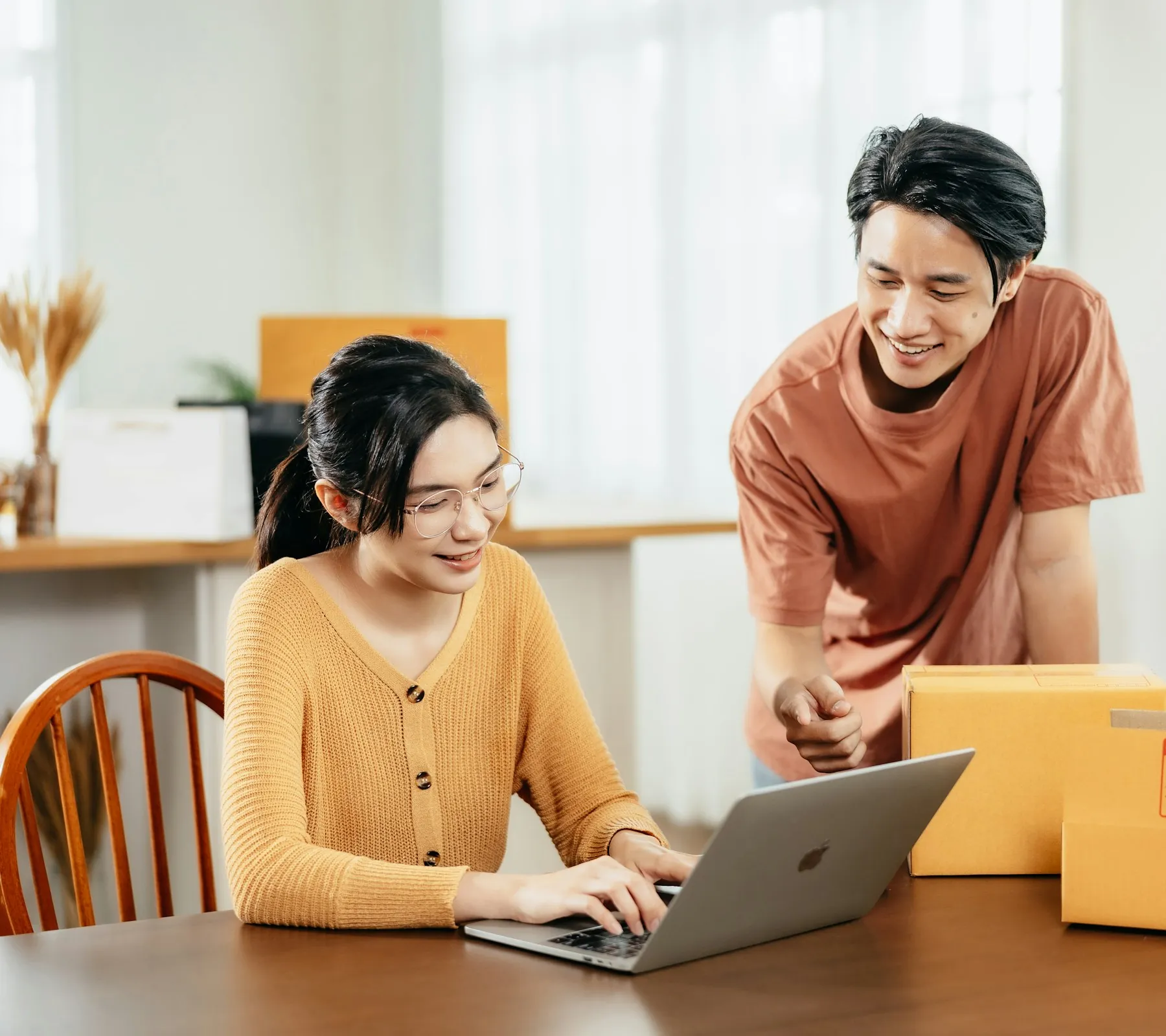 A couple going through their figures together at home
